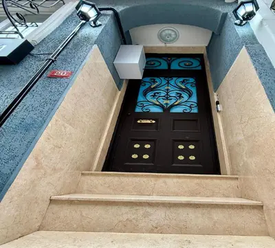 a front door of a house with stairs at Armagan Home Taksim in Istanbul
