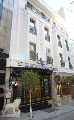 a large white building with a sign on it at Laleli Blue Marmaray Hotel in Istanbul