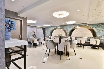 a dining room with a table and chairs at Istanbul Taksim Pera Star Hotel - Istiklal Street in Istanbul
