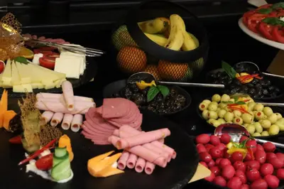 a table filled with lots of different types of food at Istanbul Taksim Pera Star Hotel - Istiklal Street in Istanbul