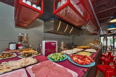 a buffet with many different types of food on a table at Taksim Istanbul Nis Hotel - Istiklal Street in Istanbul