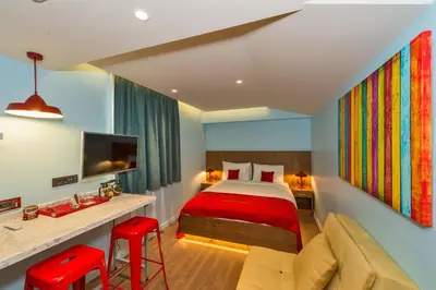 a hotel room with a bed and a desk at Taksim Istanbul Nis Hotel - Istiklal Street in Istanbul
