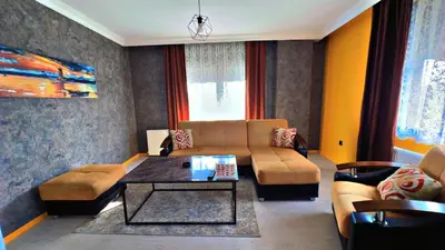 a living room with a couch and a table at 216 Blue Life in Istanbul