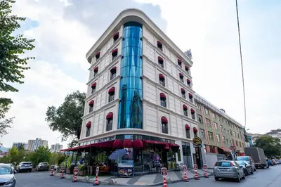 a tall building with a blue and white at 216 Star in Samandra