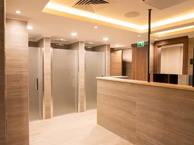 a dressing room with a counter and a mirror at Wellwood Otel in Sapanca