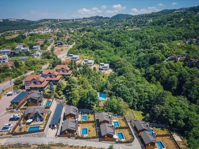 an aerial view of a village with houses and trees at Sapanca Grandwooden Deluxe in Sapanca