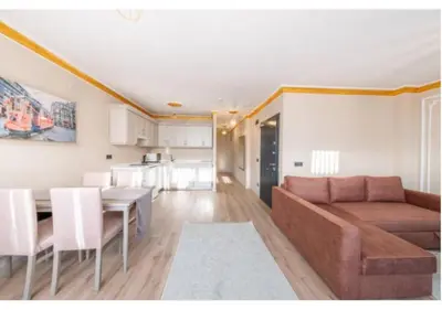 a living room with a couch and a table at Taksim Studio Apart in Istanbul