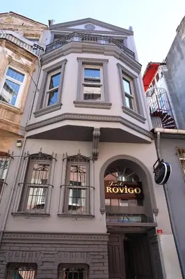 a large white building with a kovo sign on it at Rovigo Hotel in Istanbul