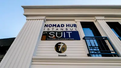 a sign on the side of a building at Nomad Hub Suit İstanbul in Istanbul