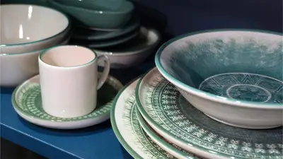 a group of plates and cups on a table at Miller Home's in Istanbul