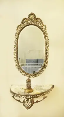an ornate mirror on a table in front of a bedroom at Stunning 5 Bedroom Sunlit Apartment Galata in Istanbul