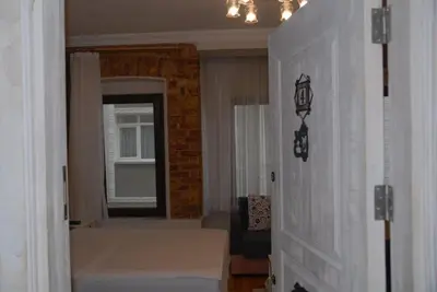 a room with a bedroom with a bed and a window at Ozcans Pera Sururi Flats 4 in Istanbul