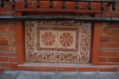 a window on the side of a brick building at Ozcans Sururi Pera Flats 8 in Istanbul