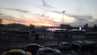 a parking lot with a lot of cars and buses at Sweet Home Kadikoy in Istanbul