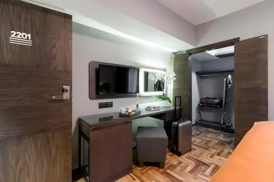 a hotel room with a desk and a tv at Lampa Design Hotel-Special Category in Istanbul