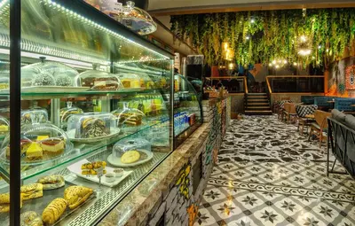 a bakery with a display case filled with food at Hotel Bossuite Kadikoy in Istanbul