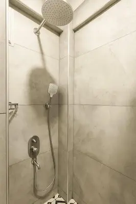 a shower in a bathroom with a glass door at Sare Apartments - Sultanahmet in Istanbul