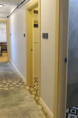 a hallway with a door leading into a room at Sare Apartments - Sultanahmet in Istanbul