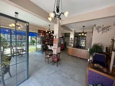 a lobby of a store with tables and chairs at Queen Seagull Boutique Hotel in Istanbul