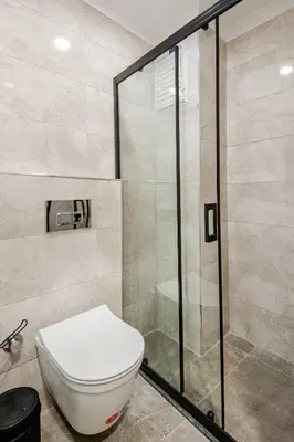 a bathroom with a toilet and a shower at B Polat in Istanbul