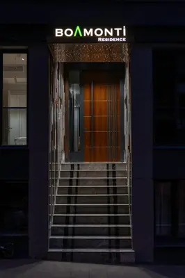 a entrance to a building with stairs in front at Boamonti Residence Sisli Apart in Istanbul
