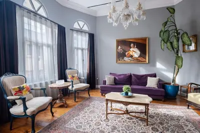 a living room with a purple couch and chairs at Grand Historic 3BD2Bath Galata Tower Pad! #408 in Istanbul