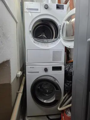 a washing machine and a washer in a room at Firuzağa Retreat Studio in Beyoğlu in Istanbul