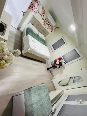 a small room with a bed and a sink at sefa yacht hotel in Istanbul