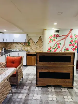 a kitchen with a bench and a table in a room at sefa yacht hotel in Istanbul