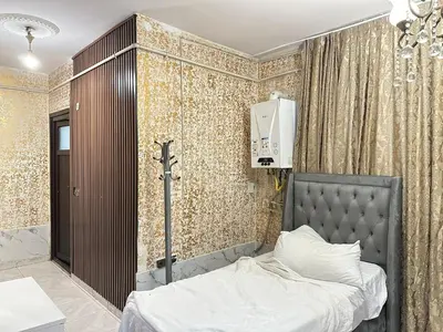 a bedroom with a bed in a room at Ayasofya suıtes apart otel in Istanbul
