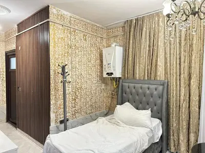 a bedroom with a bed in a room at Ayasofya suıtes apart otel in Istanbul