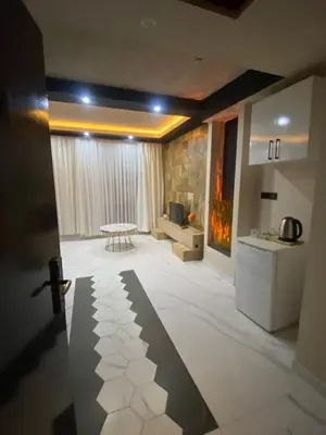a large living room with a table and a couch at paradise hotel in Istanbul