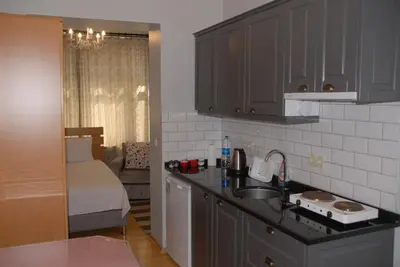 a kitchen with a sink and a counter top at Ozcans Pera Flats 4 in Istanbul