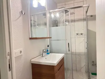 a bathroom with a sink and a shower at Konakkoy 1 in Istanbul