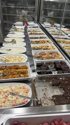 a buffet line with many different types of food at Kurban Otel in Istanbul