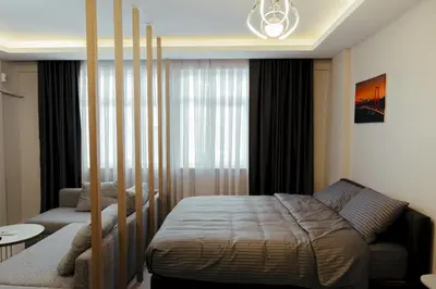 a bedroom with a bed in a room at The Old Bazaar Suites Apartment in Istanbul
