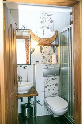 a bathroom with a toilet and a sink at Hotel SPHENDON in Istanbul