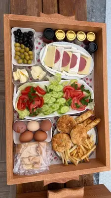 a wooden box filled with different types of food at Zeyno Sapanca in Sapanca