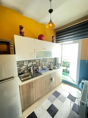 a kitchen with a sink and a counter top at Taksim Square home in Istanbul