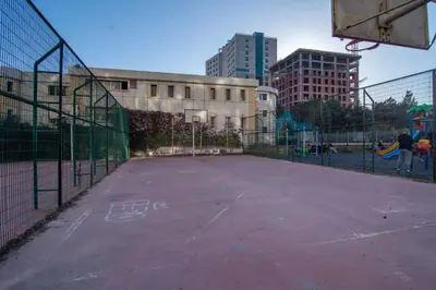 an empty basketball court in a city at Cozy 1BR with Inviting Balcony in Beylikduzu