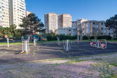 a park with a lot of exercise equipment in a city at Cozy 1BR & Sofabed with Two Inviting Balconies in Beylikduzu