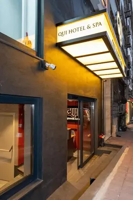 a building with a sign for a hotel and spa at QUİ Hotel&SPA in Istanbul