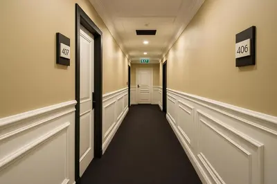 a corridor of a hallway with a hallway at Loft Airport Hotel in Arnavutköy