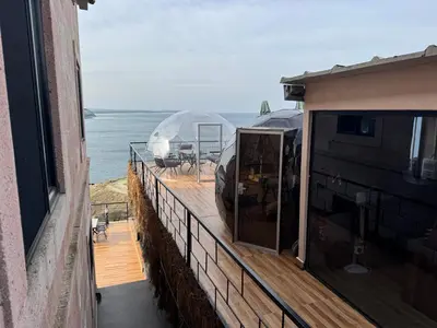 a balcony with a view of the ocean from a house at Marina Boutique Hotel Istanbul Airport in Karaburun