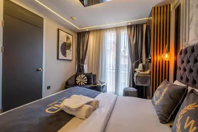a hotel room with a large bed in a room at The Wind Beşiktaş in Istanbul