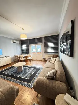 a living room with a couch and a table at Residence 4 in Istanbul
