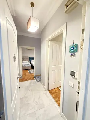 a hallway with a door leading to a bedroom at Residence 4 in Istanbul