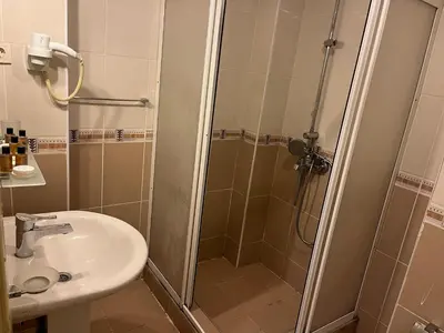 a bathroom with a shower and a sink at Bahar 5 in Istanbul