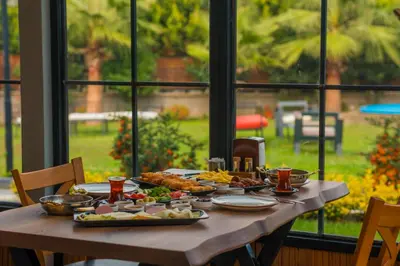 a wooden table with food on top of it at Country Life Sapanca in Sapanca