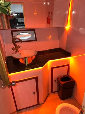 a small bathroom with a sink and a toilet at Private Luxury Bosphorus Yacht 2 Continents Experience in Istanbul